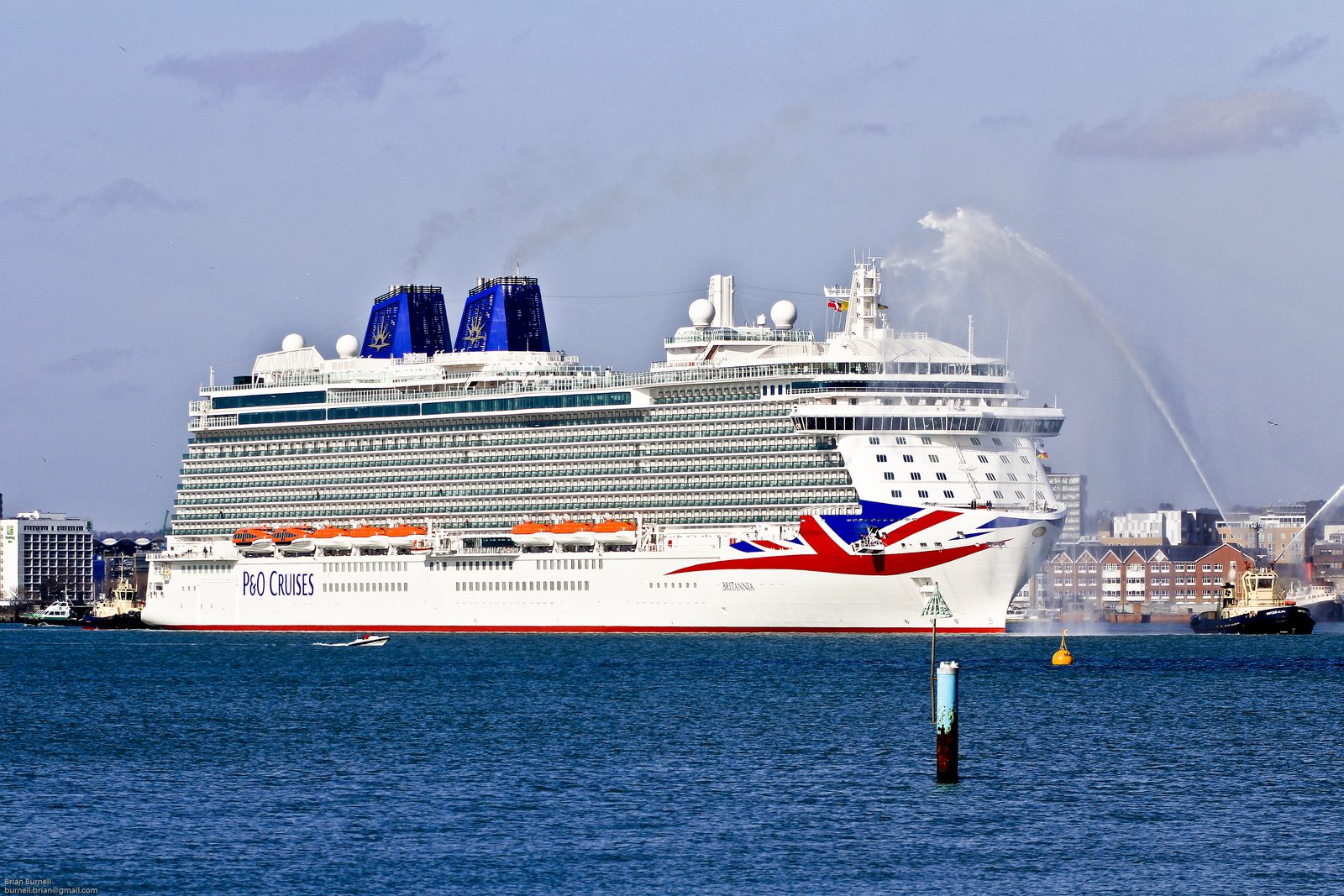 P&O Cruises ship Britannia, with Union Flag bow livery, arriving at Southampton