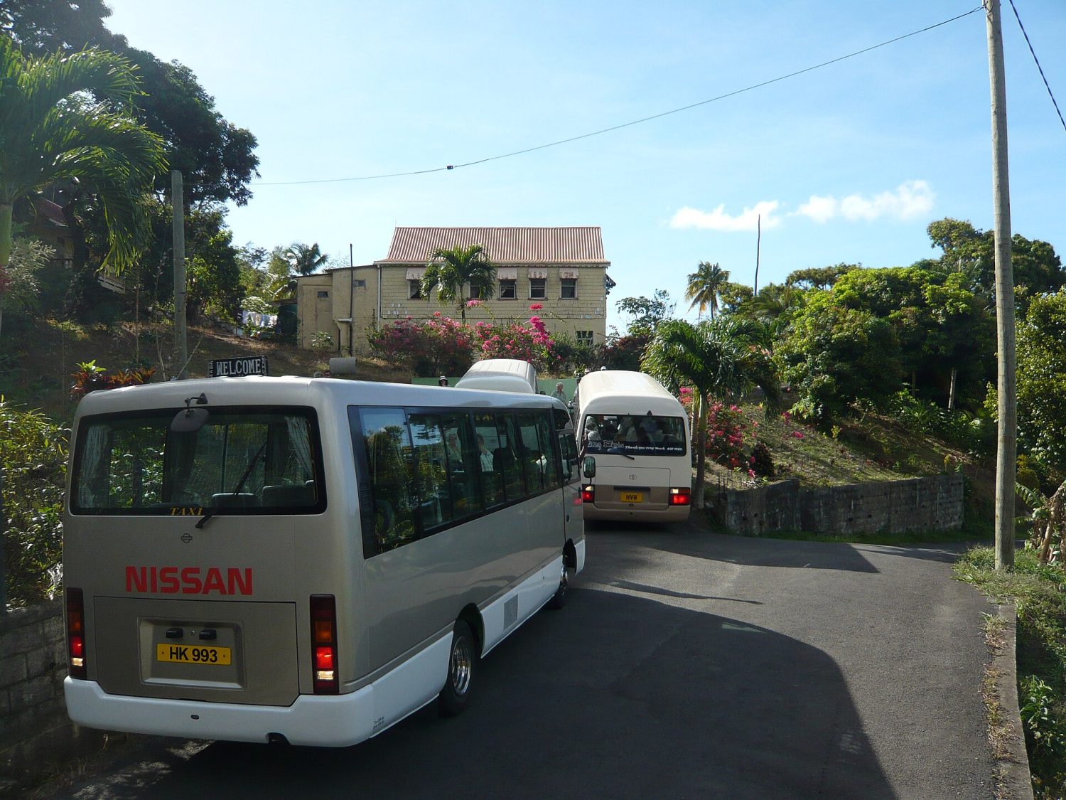 A road scene in Grenada showing local traffic