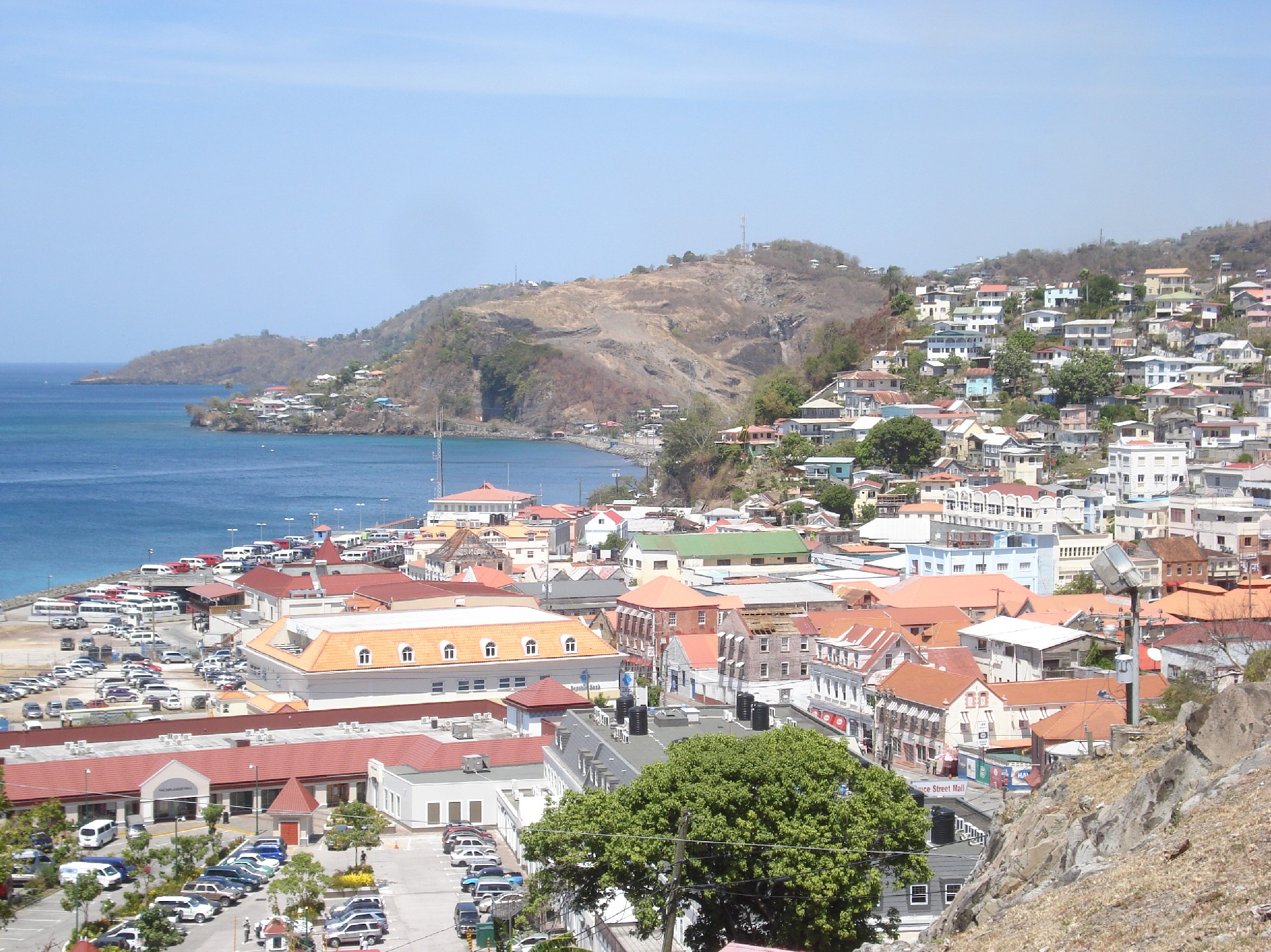 St. George's in Grenada seen from above, houses and streets rising from the harbour